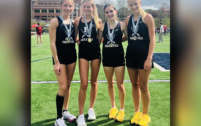The Lady Rebels 4x800 meter relay team, from left, Ava Acker, Lindsey Holloway, Karli Sams and Kensley Pickelsimer, placed first in the Georgia Spring Break Showdown.