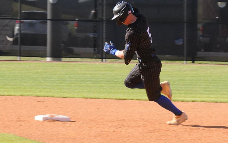 Fannin County’s Carson Callihan sprints for second base in an April 15 home game.