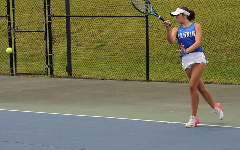 Taber Pass hits a a return in the Fannin County Lady Rebels win over Haralson.