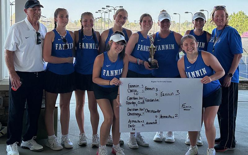 The Lady Rebels celebrate becoming Georgia’s 7-A Division One tennis champions. Shown from left are, front; Sadie Patton and Izzie Jabaley; and back row, Coach Mark Miller, Gracie Tutterrow, Karleigh Hurd, Karis Hurd, Maddie Schueneman, Kendall Clore, Tabor Pass and Coach Suzianne Pass. Following the victory that came in Rome, Georgia, the Lady Rebels will host the first round of the girls state tennis championships.