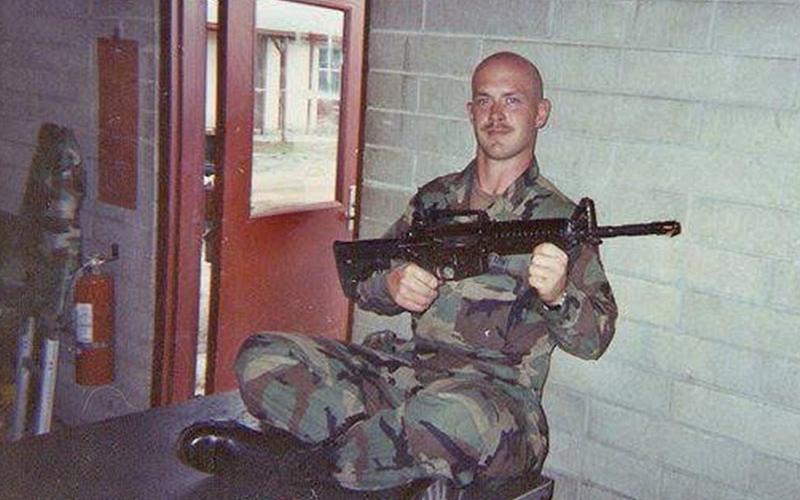 Medic Aaron Born attends a 2004 summer training camp weekend with the first battalion of the 108th Cavalry Regiment in southern Georgia.