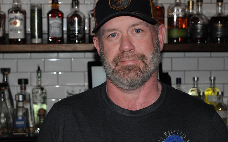 Former National Guard medic Aaron Born is shown at his bar in Blue Ridge, Misty Mountain Hops.