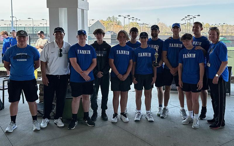 The Fannin County High School boys tennis team is shown at the Rome, Georgia Regional Championships. From left are, front row; Assistant Coach Hunter Satterfield, Coach Mark Miller, Madden Deeter, Cash Goulah, Garrett Pittman, Cayson Mitchell and Coach Suzianne Pass; and, back row, Jonathan Bewley, Henry Schueneman, Jamison Dickey, Austin Prieto and Odin Rea-Gutierrez.