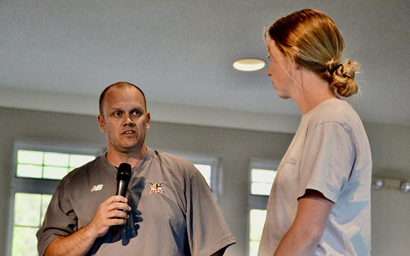 Matt Queen, 515 Fellowship of Christian Athletes director, introduces new Ambassador Morgan Holt during a fundraising event featuring former University of Georgia football Head Coach Mark Richt Tuesday, April 22.