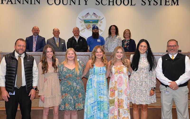 Fannin County High School Family, Career and Community Leaders of America were celebrated during the Board of Education’s April 10 meeting. Principal Dr. Scott Ramsey, Adeline Beavers, Lyla Webb, Eleanor Hodgson, Baylei Todd, teacher Kristen Stone and CTAE Supervisor David Henson are shown from left, front; and, back, board members, Chairman Mike Cole, Bobby Bearden, Adam Born, Robert Patterson, Ashley Herendon-Weeks and Superintendent Shannon Dillard.