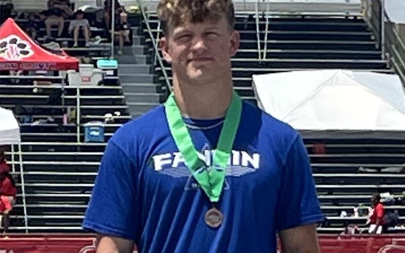 Cooper Born finished seventh in Discus during State Championship meet competition.