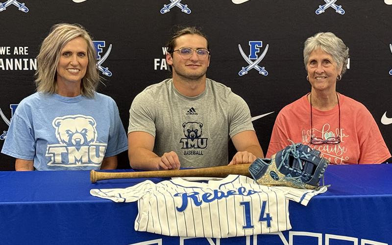 Colton Gray, center, signed his letter of intent to play baseball at Truett McConnell University as Elisa Housley, left, and Doris Housley witnessed the event.