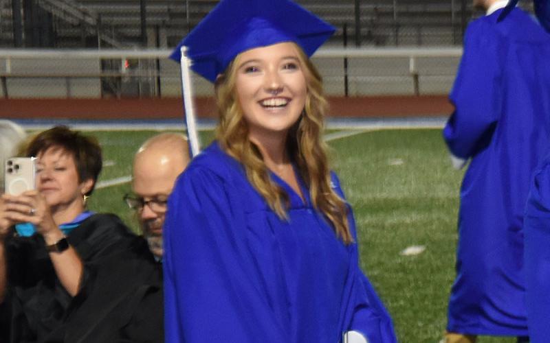 All it took to find a smiling face Friday night was to look for a graduate.