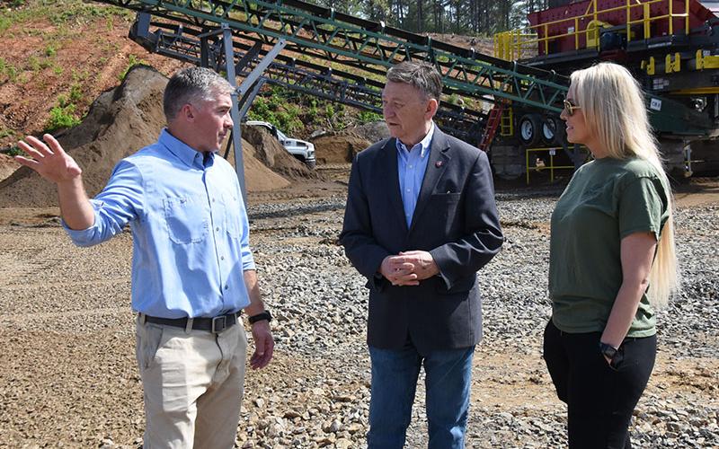 Jon Neumann, vice president of Material Sales Company, talks about the potential of the Copperhill Quarry with State Representative Dan Howell, center, and Polk County District Three Commissioner Samantha Trantham.