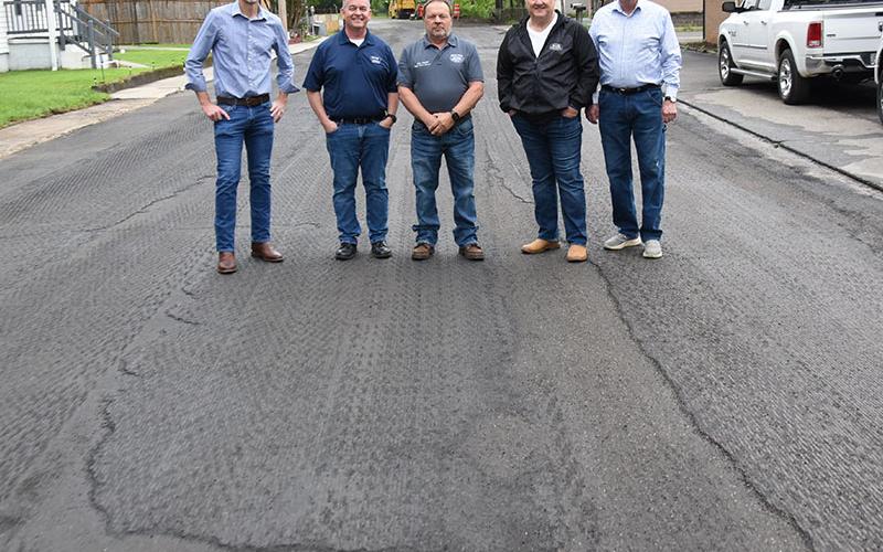 Fannin County officials gathered with Copperhill Mayor Greg Barker on West Tennessee Avenue last Wednesday morning after the street had been milled and prepared for paving. With the potholes already gone, motorists were finding much smoother travel along the busy corridor. Barker, from left, is shown with Commission Chairman Jamie Hensley, Public Works Director Zack Ratcliff and Post commissioners Johnny Scearce and Glenn Patterson.