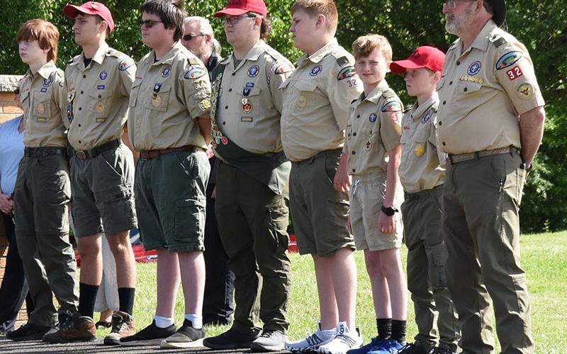 Boy Scouts from Troop 32 in Epworth took part in the traditional placing of American flags on the graves of veterans in Crestlawn Cemetery off Mobile Road. Preparing to place flags are, from left, Clay Dillard, Maddix Trantham, Patrick Thomas, Roy Green, Grant Dilbeck, Max Benson, Ethan Threet, and Scoutmaster David Lewis.