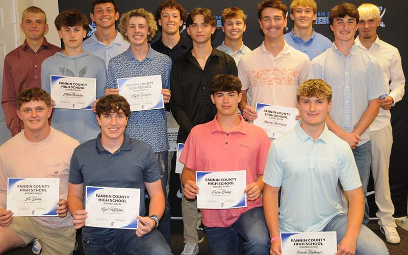 Fannin County High School Rebel baseball players received awards for their accomplishments this season at a Friday, May 16 banquet. Holding some of their honors are, from left, front, Eli Queen, Reid Patterson, Casen Bailey, and Isaiah Stephens; second row, Ethan Owensby, Elijah Weaver, Bristol Hughes, Mason McDaniel, and Brayden Walker; and, third row, Rylin Davis, Karson Brown, Drew Barfield, Carson Callihan, Bryson Cole and Gavin Davis.