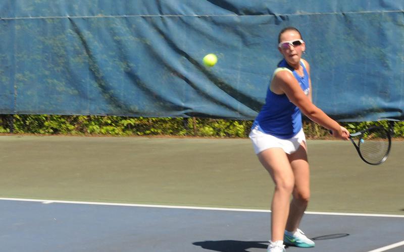 Lady Rebel Gracie Tutterow hits back a ball in an April 30 tennis match at Fannin County High School.