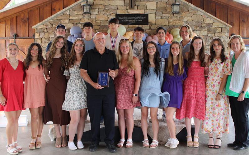 The Fannin County High School Rebels tennis teams made their way to the state championship together and received awards at a Sunday, May 18 banquet. Displaying some of their honors are, from left, Izzie Jabaley, Sadie Patton, Pipe Stroemer, Karis Hurd, Mark Miller, Kendall Clore, Karleigh Hurd, Maddie Schueneman, Taber Pass, Gracie Tutterrow, Suzianne Pass; and, back, Madden Deeter, Henry Schueneman, Austin Prieto, Cayson Mitchell,Garrett Pittman, and Cash Goulah.