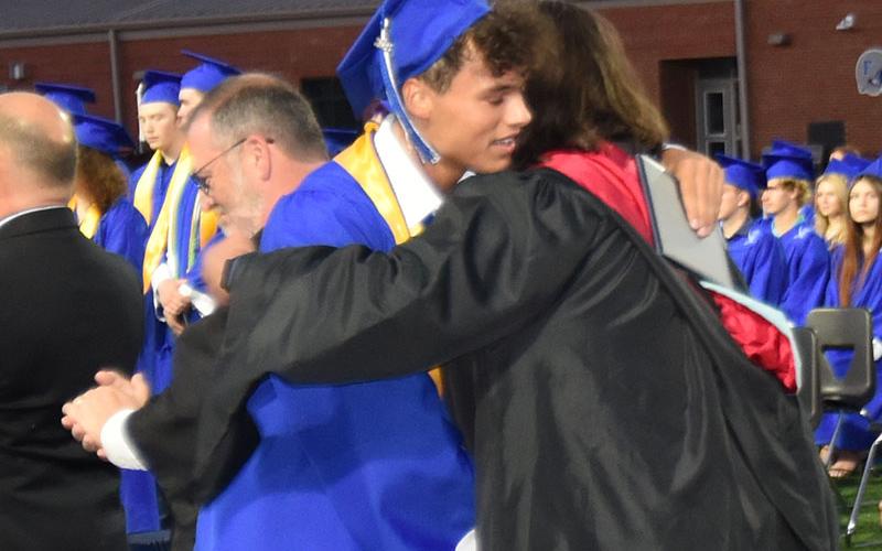 Luke Holsonback is congratulated after receiving his Fannin County High School diploma.