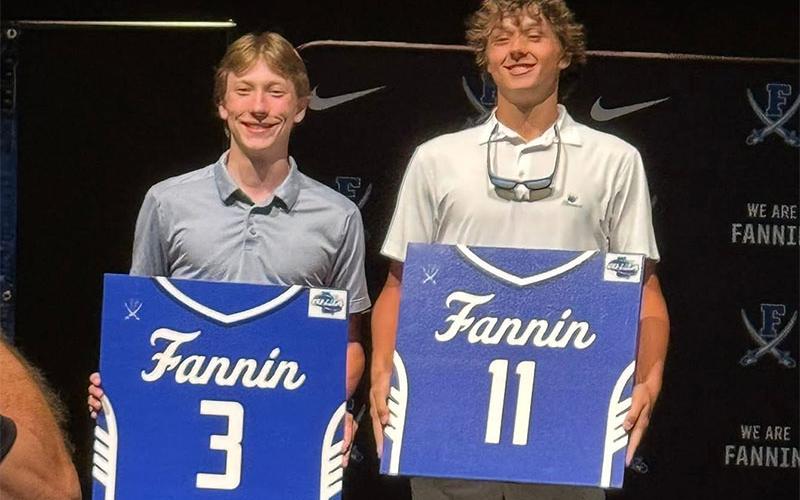The Rebel Seniors were gifted a jersey replica with their number and a GHSA Elite Eight emblem as recognition for their dedication to the program. Hudson Ethington, left, and Jack Sparks display their jerseys.