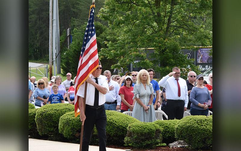 Chris McKee Posts the Colors at the beginning of the Memorial Day ceremony in the Fannin County Veterans Memorial Park. A large crowed turned out for the annual event to remember the supreme sacrifice of the men and women who have given their lives in the service of the United States.