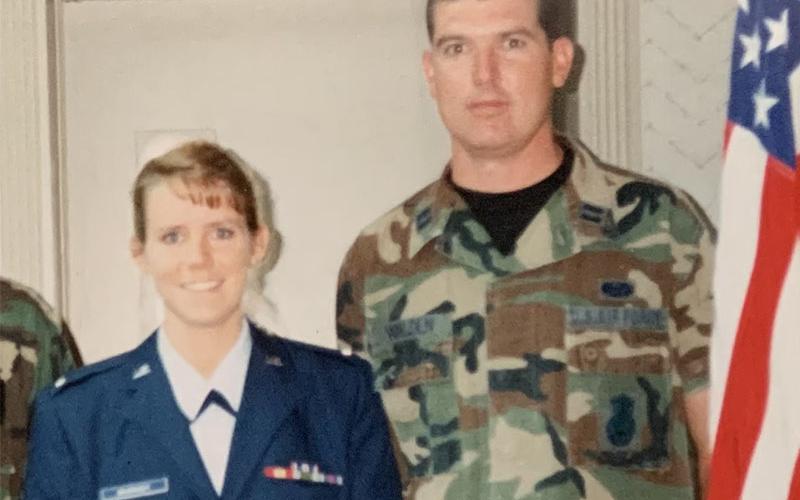 Lori Walden and her husband Chuck Walden are shown together in uniform.