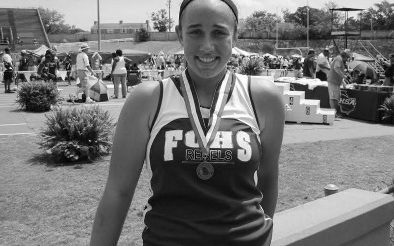 Karly Thompson with a Track &amp; Field medal.