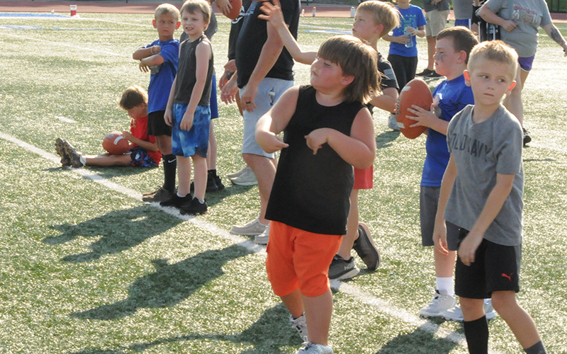 Passing drills were part of last week’s youth football camp.