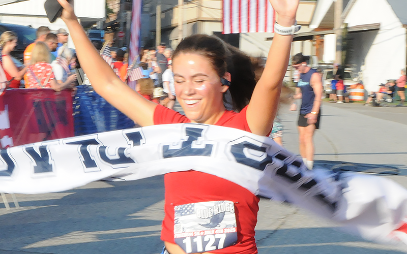Virginia Averyt wins the women’s first place at the Blue Ridge Freedom 5K.