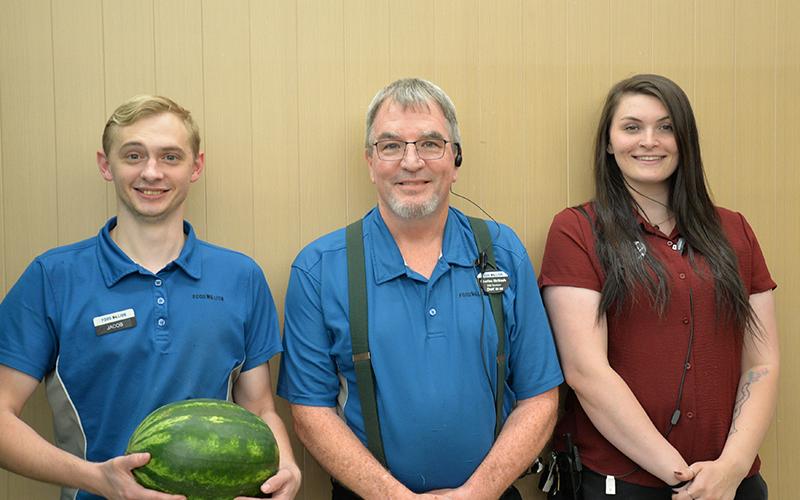 The folks at Blue Ridge’s Food Lion, from left, Jacob Keppel, Charles McNash and Helen Ramey are excited to announce the Food Lion Feeds campaign.