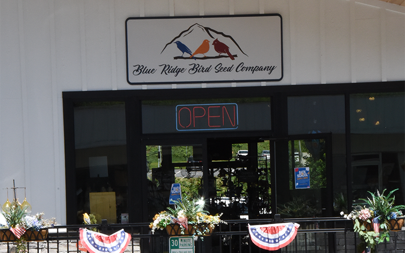 You can find Blue Ridge Bird Seed Company from either East Main Street or the Mountain Street Parking lot.