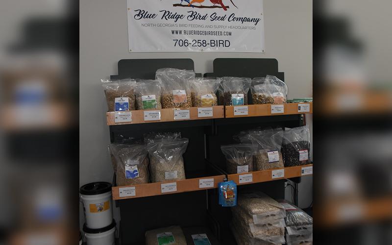 Birdman’s Blend, the trademarked birdseed mix of the Blue Ridge Bird Seed Company, is a generic mix designed to suit a wide variety of birds. The store carries a wide variety of bird seed in addition to many accessories. The store is a labor of love for Jamie Davis, who co-owns the store with her father, Lou Davis.