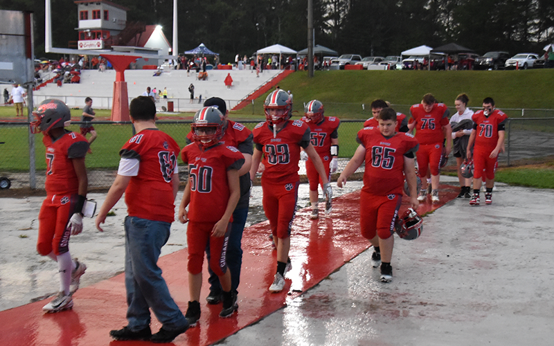 This scene repeated itself at Copper Basin Friday night as lightning forced the delay of the Cougars game against the Towers HIgh School Titans, and teams were ordered off the field.