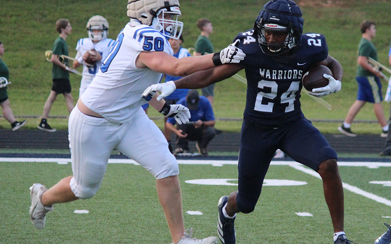 Fannin’s Isaac Watkins goes for a tackle in the Rebels win over White County. Photo courtesy of Mark Turner, White Co. News