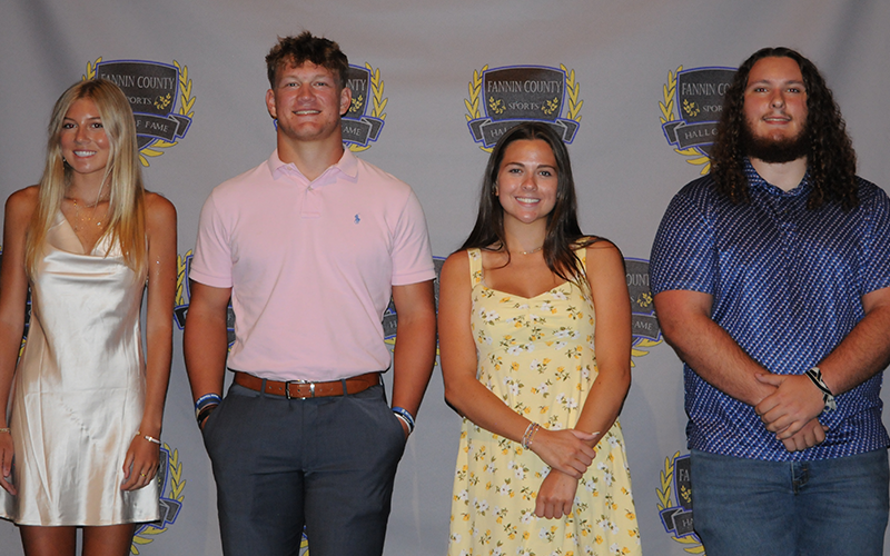 Lindsey Holloway, Cooper Born, Madison Pelfrey and Jacob “Dozer” Dye, from left, were presented scholarships by the Fannin County Sports Hall of Fame.