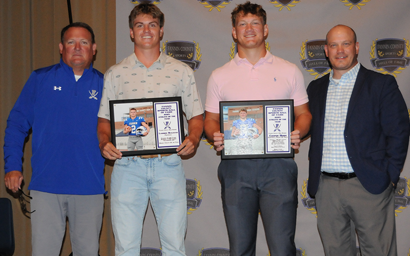 Male Athletes of the Year honored by the Fannin County Sports Hall of Fame included Lawson Sullivan and Cooper Born. Shown during the Hall’s annual banquet are, from left, head football coach Chad Cheatham, Sullivan, Born and Born’s father and president of the Hall of Fame committee, Adam Born. Not pictured is Athlete of the Year Carson Callihan.