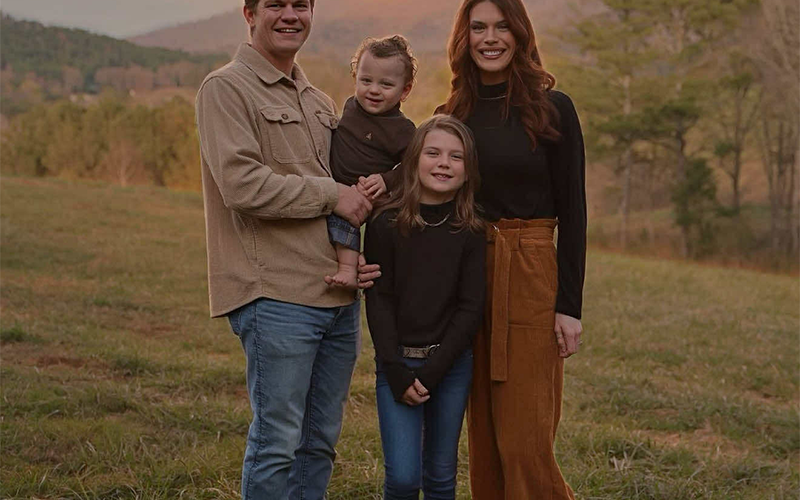 Tuff Born is shown happy and healthy as can be with his family, from left, father Jake, sister Baker and mother Michaela.