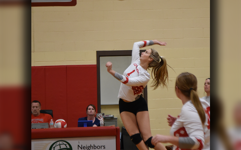 Copper Basin’s Alexis Hyatt goes after a return for the Lady Cougars. Against Polk County, the senior recorded five aces.