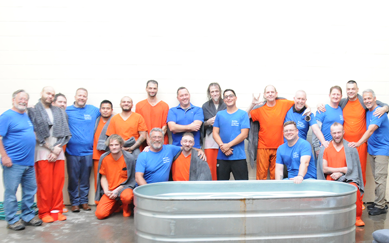 The first group of men to be baptized in the Fannin County Jail last Tuesday night, September 16, are shown with members of the Breaking Chains ministry. Two services were held to accommodate the night’s events.