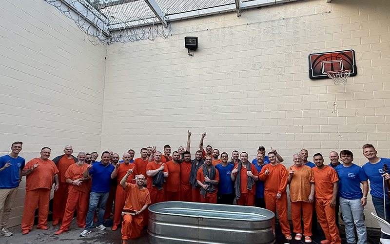 A second service held last Tuesday night, September 16, in the Fannin County Jail saw a large number of the male inmates baptized. They are shown here with Rev. Dr. Chan Mitchell of The Ridge Community Church, who conducted the service, and members of Breaking Chains ministry, regular visitors to the jail.