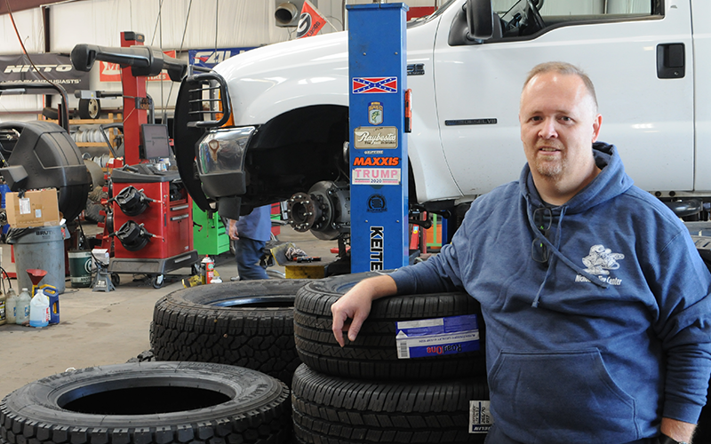 Tim Nicholson, a co-owner of Nicholson Tire Center, is shown at Nicholson Tire Center’s Damascus Road location, one of two that is part of the family business.