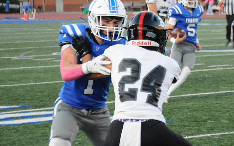 Brayden Walker makes a block for the Fannin County Rebels in previous action this year. Friday night, the Rebels improved their region record to 3-0.
