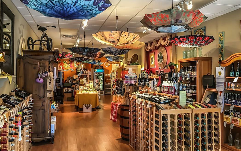 Out of the Blue has evolved since Sarah Auman opened in 2003, and now the inventory has shifted to perishable items; fine wine and cheese, olive oils, and the like.