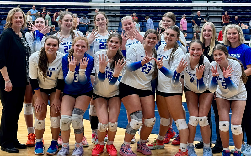 The Fannin County High School volleyball team has reached the Elite Eight and will play today, Wednesday, October 22, against top ranked Bremen. Pictured after the win over Lamar County are, from left, front, Shannon Powell, Amberly Patterson, Keslei Kea, Maya Butler, Maggie Ledford, Karleigh Hurd, Maddie Partin; and back, Head Coach Suzianne Pass, Taber Pass, Addelyn Barnes, Karis Hurd, Kendall Clore, Audrey Veal, Jordan Deal and Madi Raines.