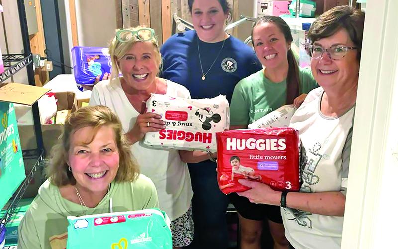 Some of the ladies behind Fostering Fannin are shown in their element, from left, Sally Masters, Swan McKnight, Stacie Hamlin, McKenzi Farris and Jan Wheeler.
