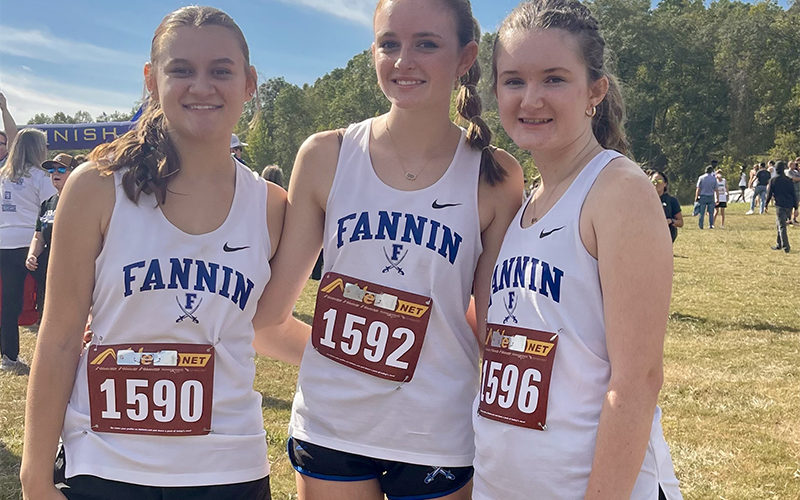 The Lady Rebels junior varsity cross country team was led by, from left, Kylee Bohnert, Addison Head, and Claire Saxon.