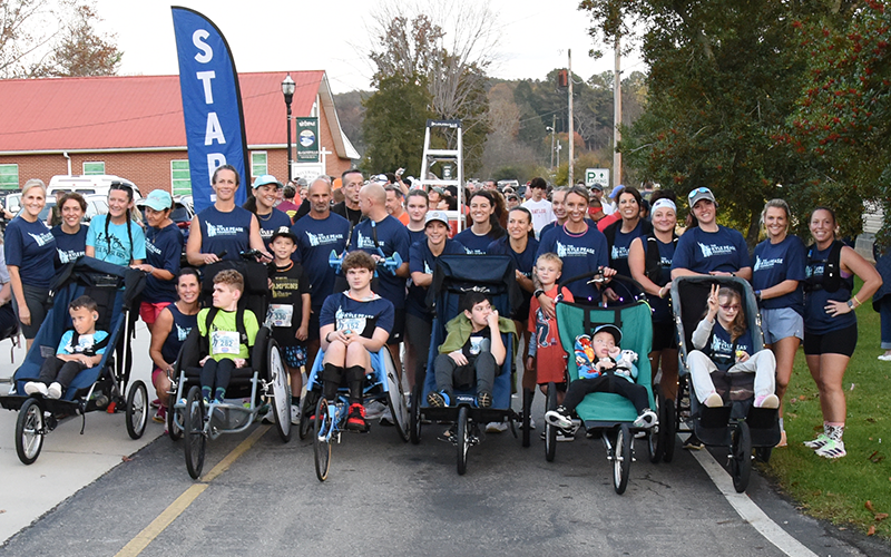In-chair athletes and their push-assist partners line up for Saturday’s Bigfoot Boogie in the twin cities of McCaysville and Copperhill. They are members of the Kyle Pease Foundation, which empowers individuals with disabilities through inclusive sports experiences. (See next week’s issue of The News Observer for the complete Bigfoot Boogie wrap up).