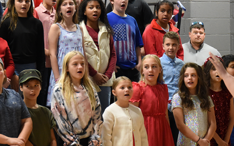 Students at Blue Ridge Elementary performed a variety of patriotic songs during the Veterans Day celebration at the school. U.S. Marine Corps veteran Sergeant Brent Ware told the students that he learned, “never, never give up,” and that should translate into their lives.
