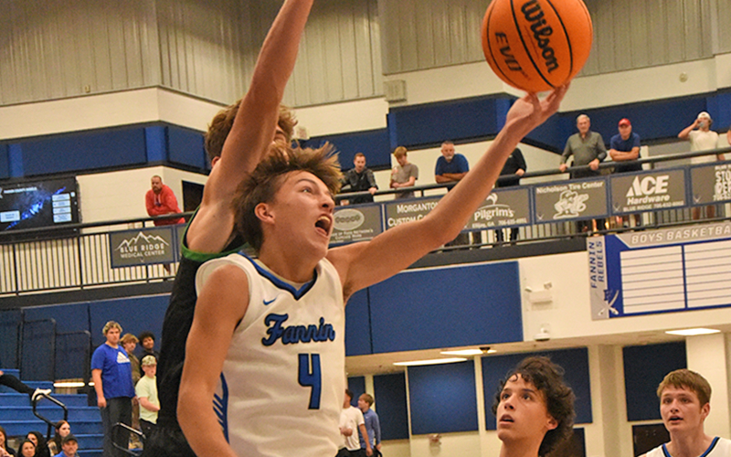 Matthew Ponton (#4) puts up two points for the Fannin County Rebels against Pickens County.