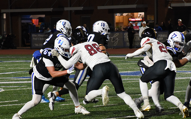 Fannin County’s Noah Burnett (64) and Jacob Green (77) block defenders for the Rebels in recent action. Both are seniors and were among those recognized during Senior Night activities October 26.