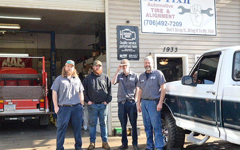 Mark Keaton, far right, and his staff of, from left, Chris Beaver, Lee Reeves and Evan Chastain believe in making customers happy.