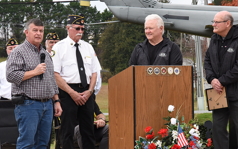 Bill Stodghill, commander of the North Georgia Honor Guard, was honored at the Veterans Day ceremony by the Fannin County commission for his work with the group and dedication to the community. Shown prior to presenting Stodghill a Certificate of Appreciation are, from left, Commission Chairman Jamie Hensley, Stodghill, and Post commissioners Johnny Scearce and Glenn Patterson.