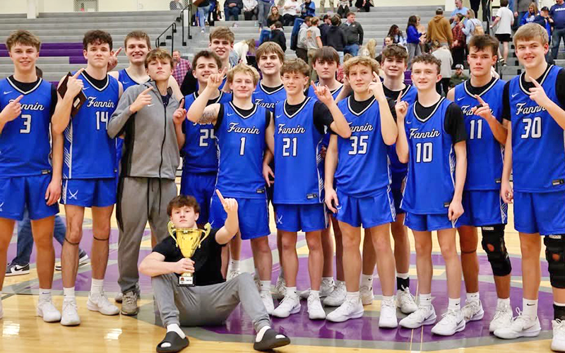 The Fannin County High School Rebels won the 2025 Piedmont Mountainside Holiday Classic Championship with a victory over Gilmer County, Monday, December 22. Shown following the game with their championship trophy are, from left, Cannon Holloway, Brody Henson, Keaton Watkins, Matthew Ponton, Kylan Dover, Kolton Kaylor, Tyler Blake, Avrey Angel, Hunter Kennedy, Camden Woosley, Garrison Ensley, Cash Lambert, Carson Callihan, Hudson York, Kolby Kaylor and sitting Jasper Mealer.