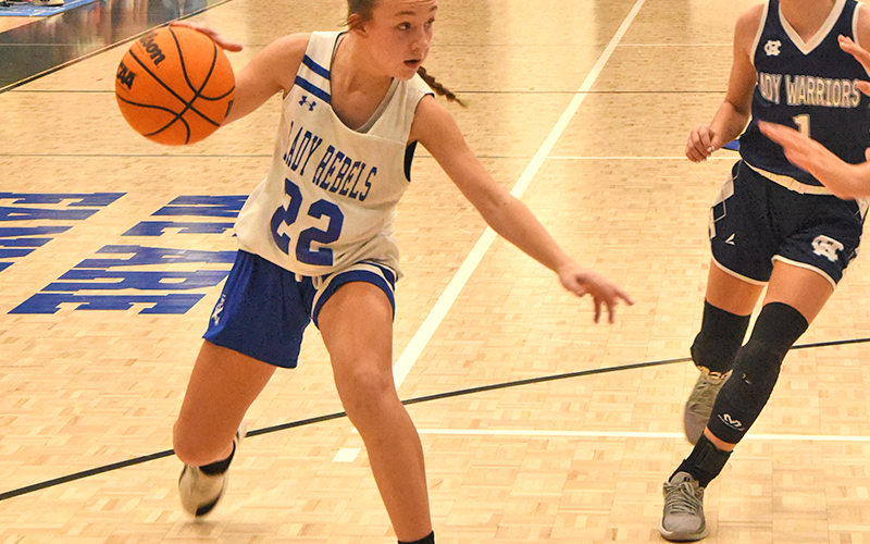 Fannin County Middle School seventh grader Alex Evans (#22) shoots against her White County opponent in the team’s Mountain League championship game December 17.